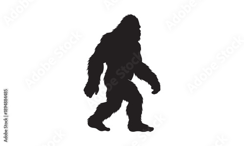 Silhouette of a walking Bigfoot or Sasquatch against a white background.