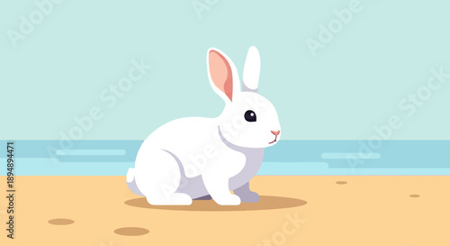 A white rabbit sits on a sandy beach with a soft blue ocean and sky