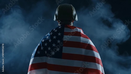 Soldier wrapped in american flag silhouette against dark smoky backdrop