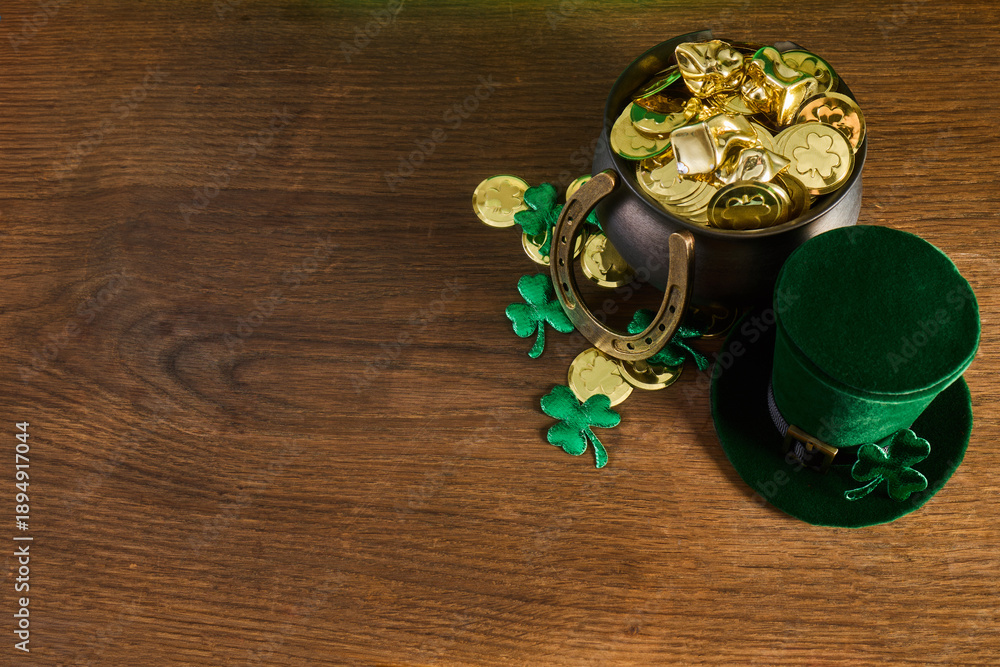 Fototapeta premium St. Patrick's day pot of gold with shamrocks and leprechaun hat