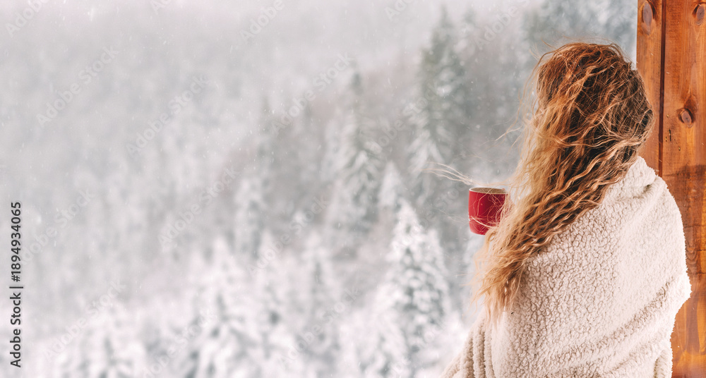 Fototapeta premium Woman Enjoying Connection with Nature and Winter Landscape