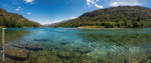 Daylight reveals greenish river water owing to rocky terrain