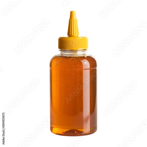 Transparent plastic squeeze bottle full of golden amber colored honey with a bright yellow cap, isolated on transparent background