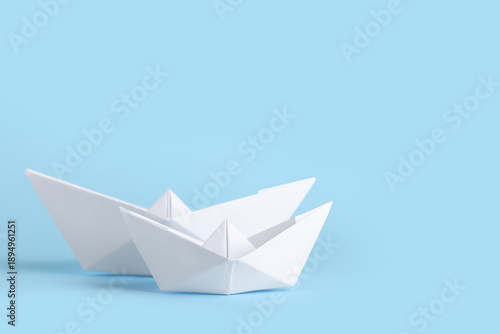 Wallpaper Mural White paper boats on blue background Torontodigital.ca