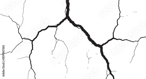 Cracked white surface with black lines and deep fissures