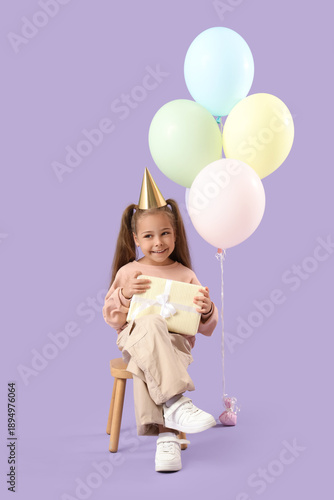 Cute little girl in party h...