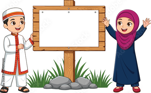 Happy Muslim boy and girl standing with blank wooden signboard for Islamic education and greeting design
