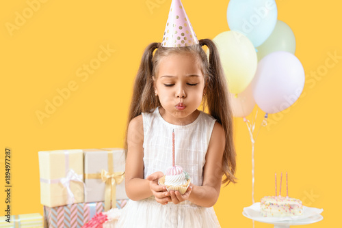 Cute little girl in party h...