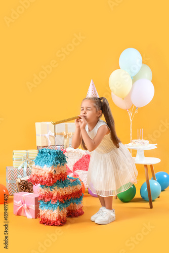 Cute little girl with party...