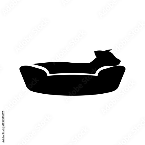 a black silhouette of a dog resting in a dog bed
