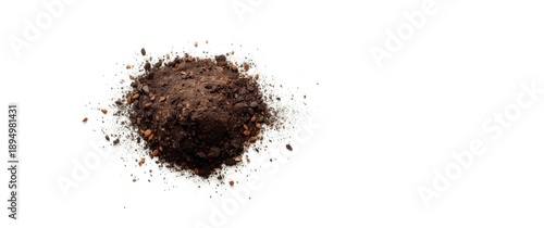 Pile of soil with scattered...