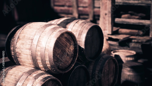 Obraz na płótnie Closeup aged barrels with pronounced grain and hoops, moody cellar light, textur