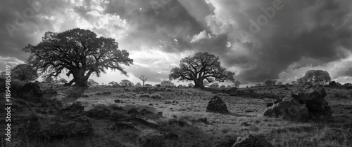 Dramatic sky over black and...
