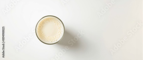 Top view of a cup with milk...