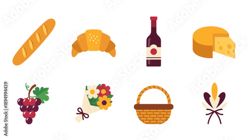 French picnic essentials: baguette, croissant, wine, cheese, grapes, flowers, and basket
