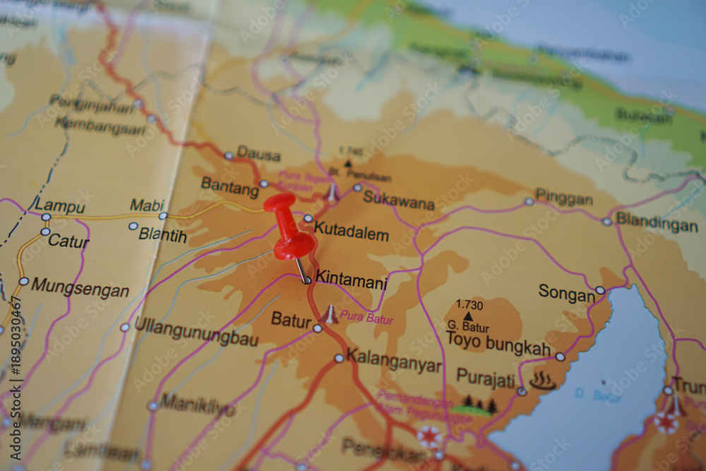 Obraz premium view of Road of Kintamani, Bali Island, Indonesia on a geographic map, marked with a red pin