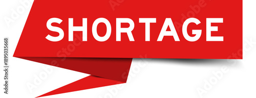 Red color speech banner with word shortage on white background