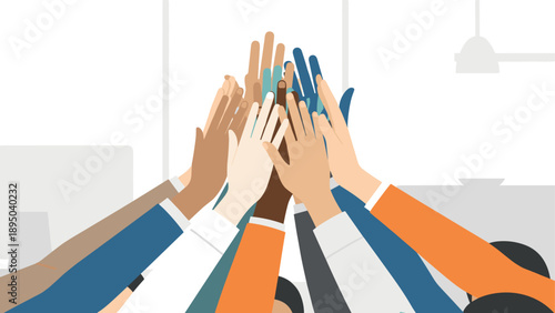 Unified hands joining in teamwork celebration in modern office setting