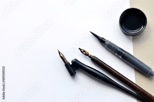 Paper, ink and calligraphy pens. Lettering Workshop details