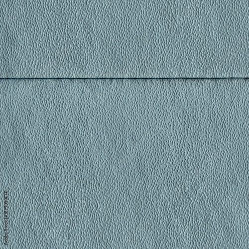 Photos Light blue textured wall surface with subtle horizontal seam