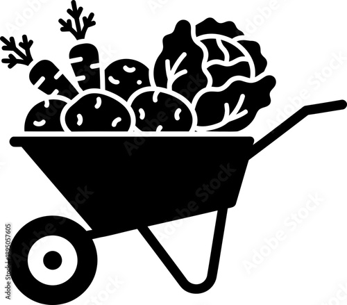 Garden wheelbarrow full of fresh vegetables. Harvesting season and healthy food concept. Simple glyph vector icon, symbol for app, web design