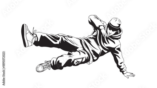 Dynamic breakdancer leaps and spins in urban street performance for a high-energy action shot.