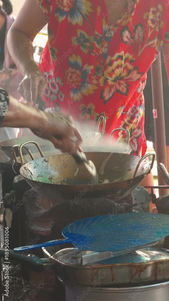 custom made wallpaper toronto digitalClose-up of a street food vendor stirring a wok, capturing the essence of local cuisine with steam rising from the pan