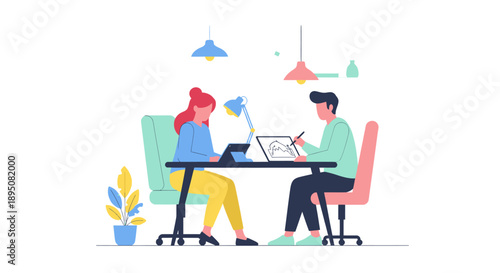 People working together on graphic design in an office.