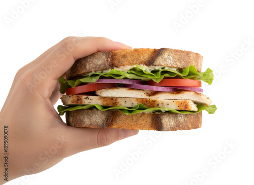 Hand Holding Grilled Chicken Sandwich with Transparent Background