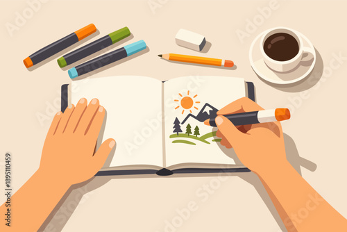 Person drawing a landscape illustration in a notebook using a marker