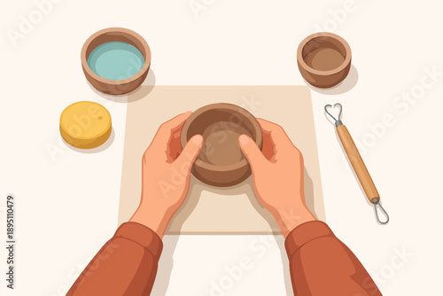 Hands molding clay bowl, creating pottery in a ceramic workshop