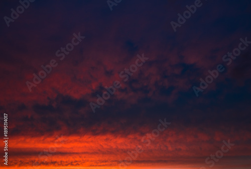 Red clouds in the sky, summer sunset, background