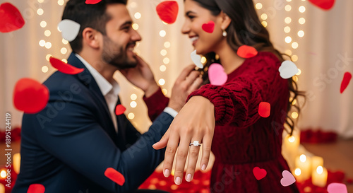 Man proposing to woman with engagement ring on valentine's day