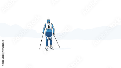 Nordic skier in blue gear on misty winter landscape