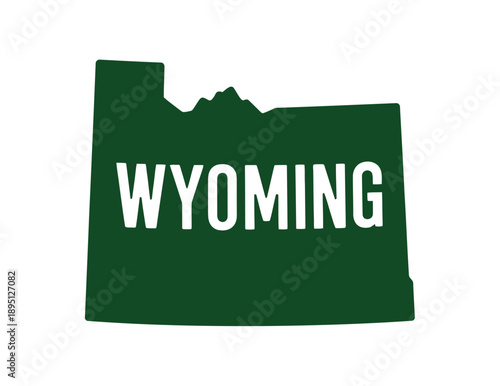 A green silhouette of the state of Wyoming with the word Wyoming written in white letters across it.
