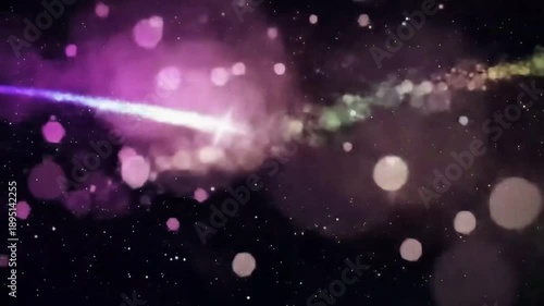 Abstract colorful trails of light cross against a dark backdrop