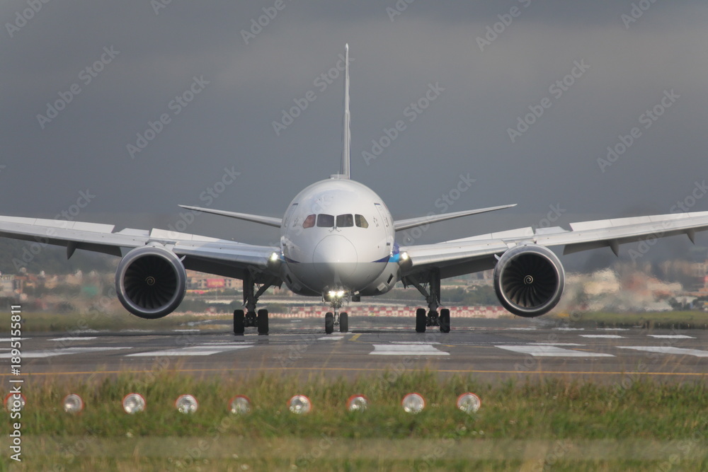 Fototapeta premium Taipei, Taiwan - January 30th, 2026 - Boeing 787 Dreamliner taxiing on the runway.