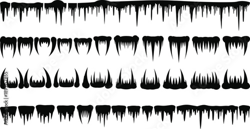 Collection of black ink or paint drip patterns on white background