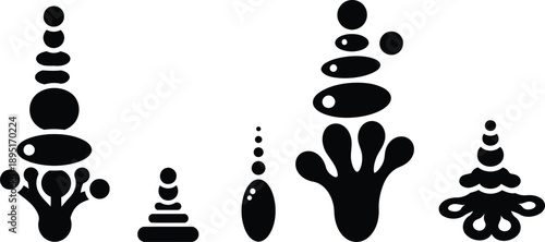 Black silhouettes of balanced stones and rock formations on white background