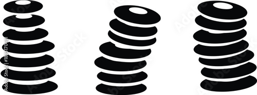 Three stacks of round flat objects in a spiral shape