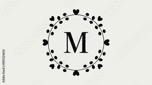 Elegant monogram letter M inside a circular floral heart wreath on a light background Keywords: monogram, letter M, initial