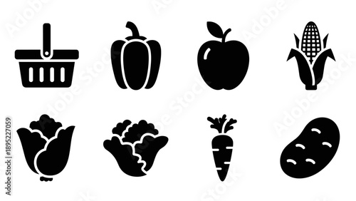 Silhouette icons of fresh produce: apple, carrot, corn, and more for food design projects