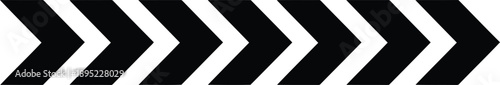 Repeating black chevrons present a clear visual cue for navigating steps or indicating a future direction