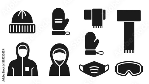Winter clothing icons: hats, mittens, scarves, and goggles in black silhouette style