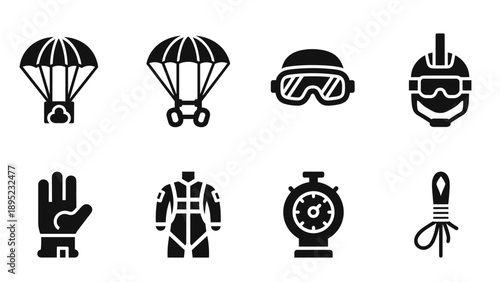 Set of parachuting and skydiving icons in black and white silhouette design