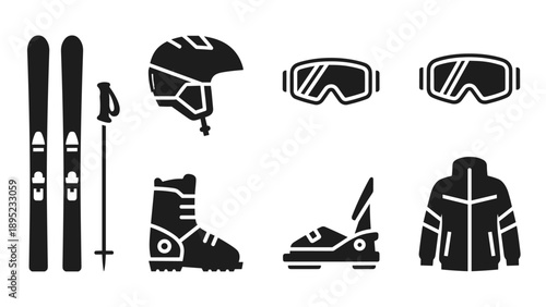 Essential ski equipment icons set in black silhouette style