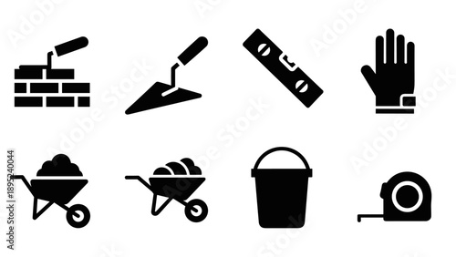 Silhouette construction tools icon set including trowel, wheelbarrow, and tape measure