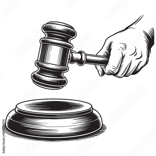 Hand holding a wooden judge's gavel poised above a sound block