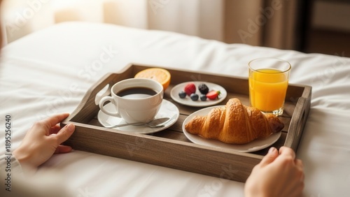 Luxurious Morning Breakfast Tray with Fresh Croissant and Coffee.