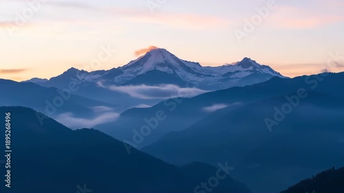 Wallpaper Mural Majestic Mountain Landscape at Dusk With Snow-Capped Peak and Layered Hills. Torontodigital.ca